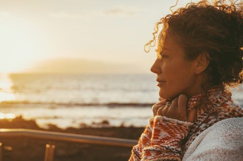 What to Expect after one year sober - a female enjoying being outside.