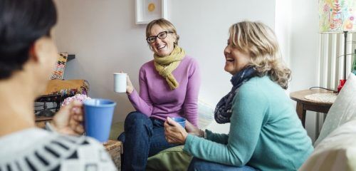Group of friends talking after rehab in Essex